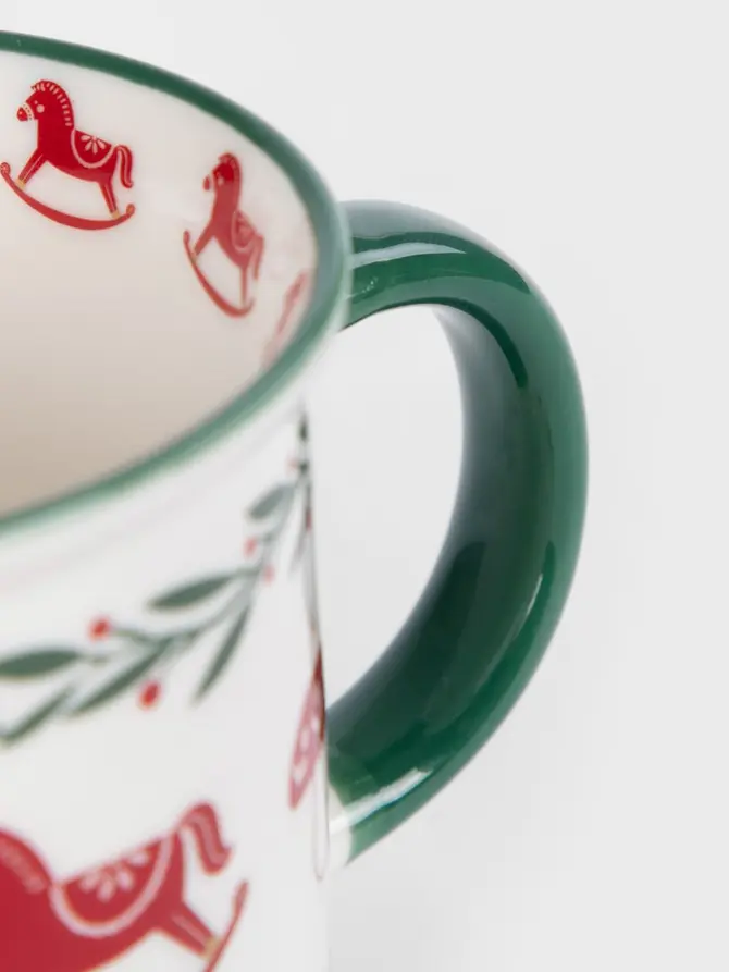 Kubek UNIS porcelanowy z koniem na biegunach i zielonym uchem 0,4 l
